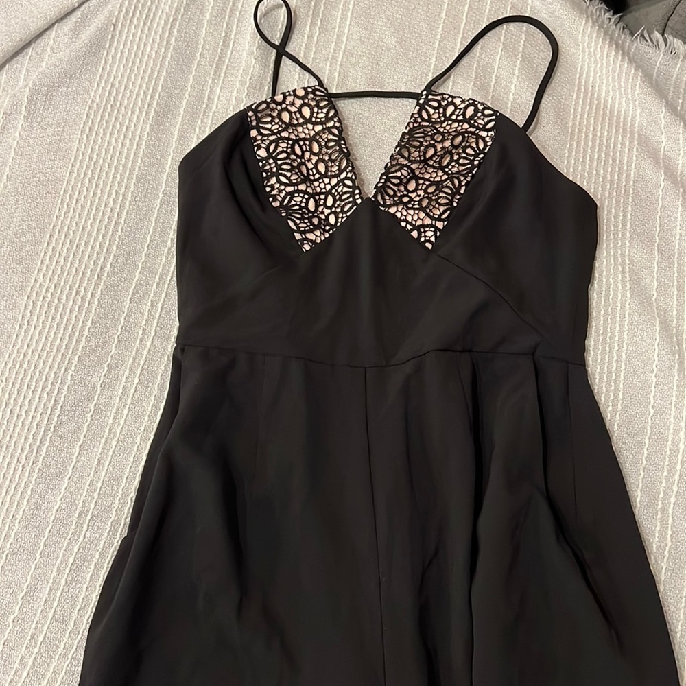 NWT jumpsuit by ASOS. So flattering for all body types- with pockets!!